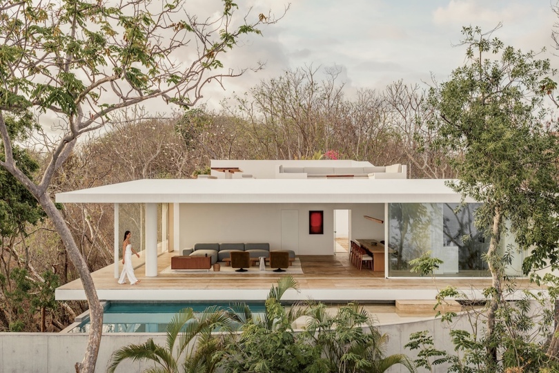 Casa Malonic海滨住宅：极简建筑与自然景观的诗意融合